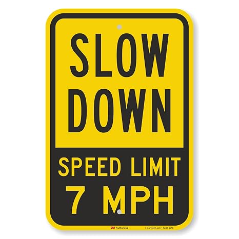 SmartSign 18 x 12 inch Slow Down - Speed Limit 7 MPH Metal Sign, 63 mil Aluminum, 3M Laminated Engineer Grade Reflective Material, Black and Yellow, Made in USA